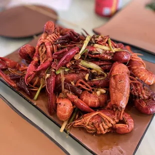 a plate of cooked crawfish