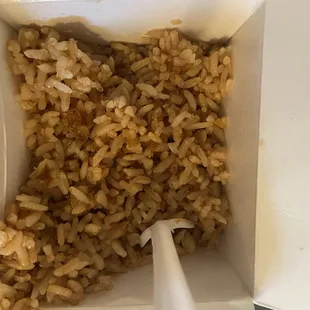 Extra for "fried rice" it's just soy sauce added in.