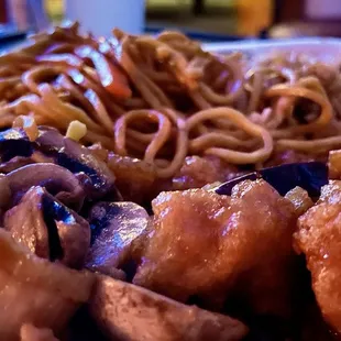 Chicken and mushrooms, General Tso Chicken, and half hack fried rice and lo mein.