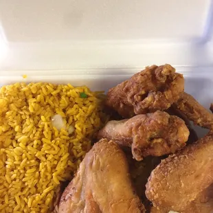 chicken and rice in a styrofoam container