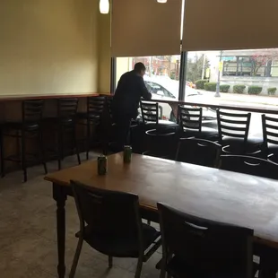 a person standing in a restaurant