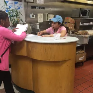 a little girl at the counter