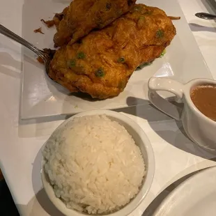 chicken satay, rice, and dipping sauce