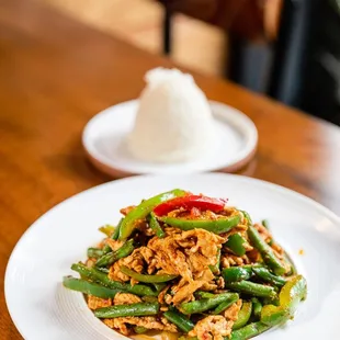 a plate of stir fried green beans