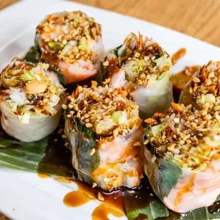 a plate of sushi rolls