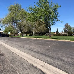 View of the field next to Americana Dr. from the school parking lot.