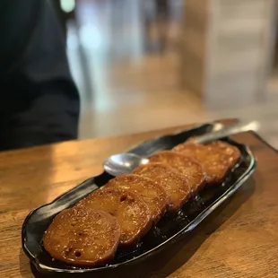 Stuffed lotus root with sticky rice and floral honey