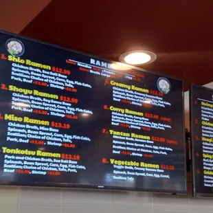 menus on the wall of a restaurant