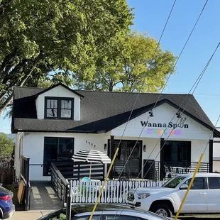cars parked in front of the restaurant