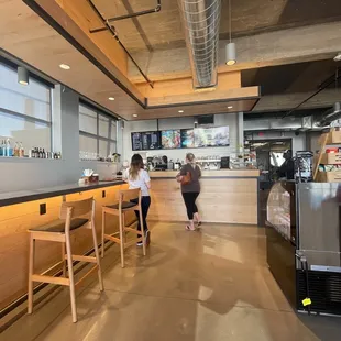 a woman standing at the counter