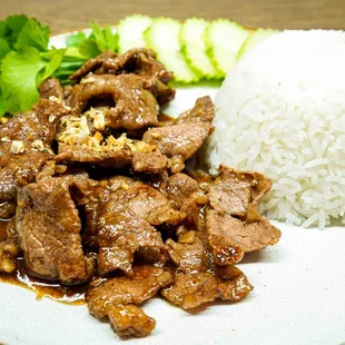 beef and rice on a plate