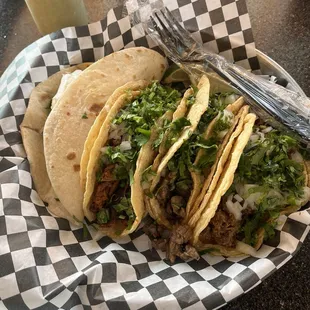 Left to right: Shredded chicken taco(flour), pastor, asada and barbacoa.