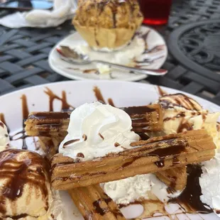 Churros infront and fried ice cream in back!