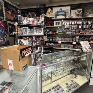Magic: The Gathering section. Not pictured on the right where I took the photo are more card sleeves, deck boxes and playmat tubes.