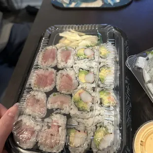 Yellowtail Roll MAKI style  and california rolls, + Edamame (not shown)