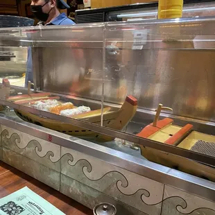 conveyor belt sushi, but replace belt with boats lol