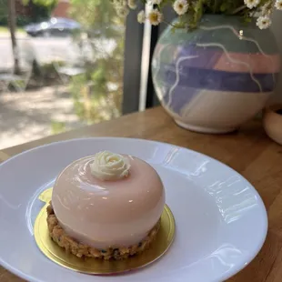 The Granada (White chocolate &amp; rose water ganache, raspberry, pomegranate compote, and almond sesame crunch)