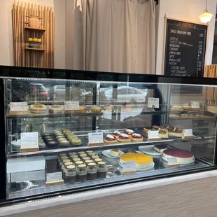 a display of cakes and pastries