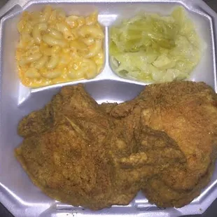 Juicy Pork Chops served with your choice of two sides.