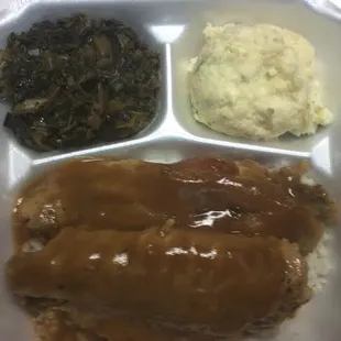 a meal in a styrofoam container