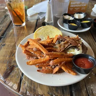 Mushroom burger with bacon and sweet potato fries.