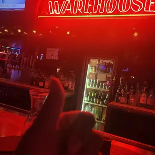 the neon sign for warehouse billiard