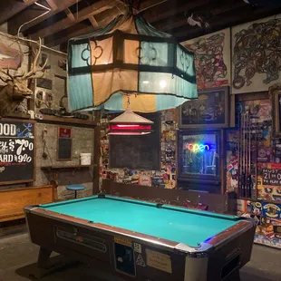 a pool table and arcade