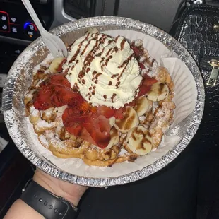 Delicious strawberry banana funnel cake.