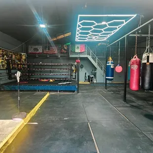 Stationary boxing bags for punching fundamentals and conditioning.