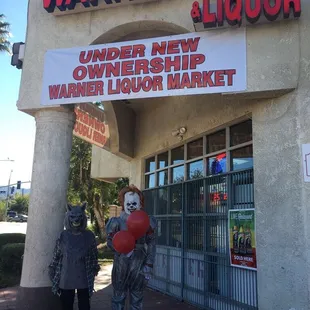 two people dressed as clowns