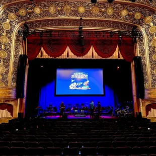 a stage with a screen in the middle of it