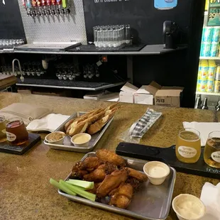 Chicken wings, beer flights, pretzel sticks.