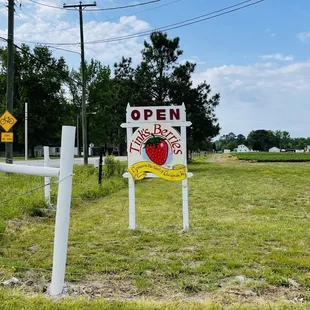 The turn is before this sign. Entrance is on Peaceful Rd