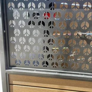 Peace signs even on the patio gate!