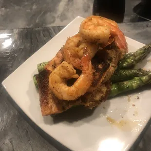 Salmon stuffed with crab, shrimp, and asparagus