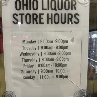 a store hours sign
