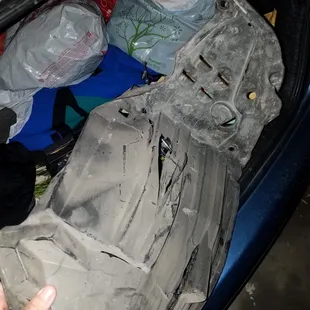 Part after it fell off my car into the road