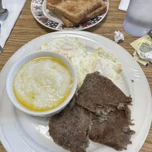 Scrapple with butter grits and eggs. Delicious.