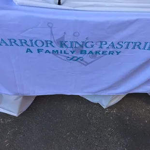 a table with a sign on it