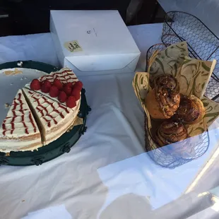 a cake and pastries on a table