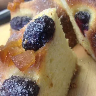 Gibassie--Made with fresh orange, anise and vanilla, topped with blackberries and candied orange.