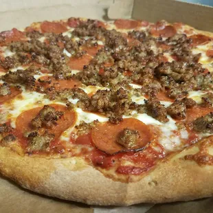 a pizza in a pizza box