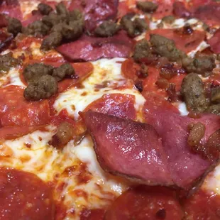 pepperoni, sausage, and cheese pizza