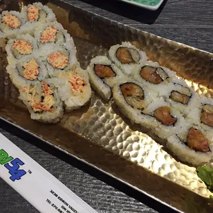 Yum yum roll (spicy crab) on the left, spicy yellowtail on the right.