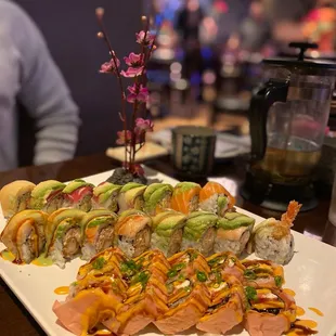 a plate of sushi rolls