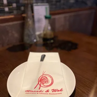 a napkin and fork on a table