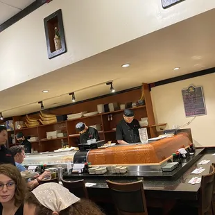 a group of people in a restaurant