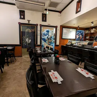 a restaurant with tables and chairs