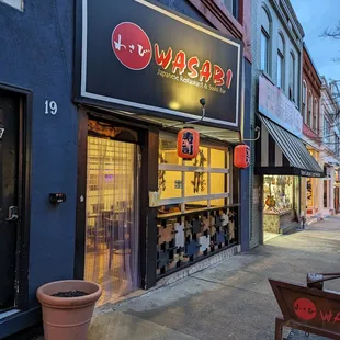 a restaurant on the corner of a street