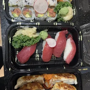 Spicy Tuna Roll, Crazy Roll, tuna nigiri, and 2 Gyoza